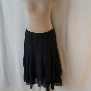 Gorgeous Cabi asymmetric hem featherweight skirt.